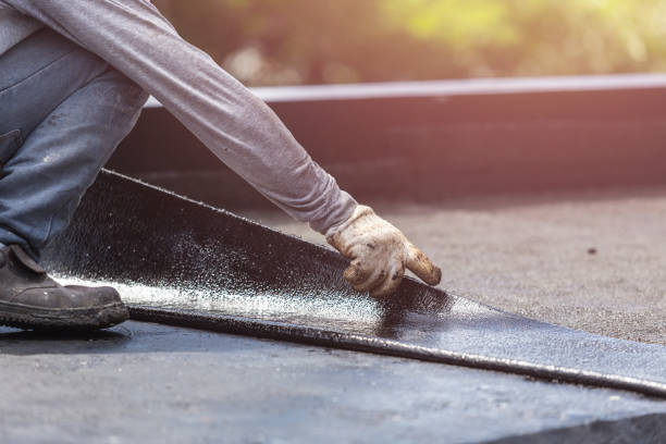 Professional Exterior Waterproofing technician working in Pell City, AL